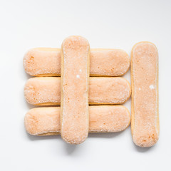 Sponge biscuit - ladyfinger savoiardi isolated on white background. Ingredients for Tiramisu.