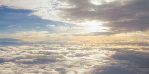 Fototapeta premium Yellow and blue dawn over clouds