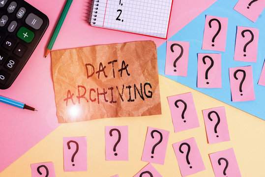 Word writing text Data Archiving. Business photo showcasing to secure and to store data for long term retention Mathematics stuff and writing equipment above pastel colours background