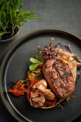 Grilled duck breast with grilled tiger prawns