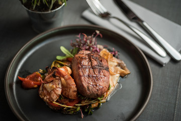 Grilled duck breast with grilled tiger prawns