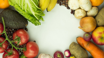 Arrangement of mixed colorful vegetables, isolated on white background with empty copy space.