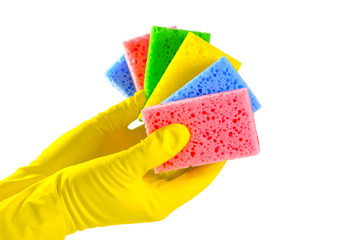 House cleaning concept. Hands in yellow protective gloves holds a lot of washing sponges, isolated on a white background.
