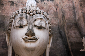 Head of the stone Buddha Wat Si Chum of Sukhothai