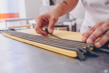 man working in a pasta factory