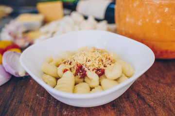 mashed pasta ñoquis with mushrooms