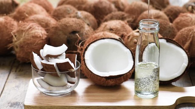 Organic  coconut oil is putting in the bottle.  Oil from coconut is a superfood or heathy food. No cholesterol. Organic coconut oil is many benefit for cooking, wash or clean hair, skin and massage. 