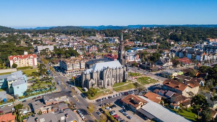 Fototapeta na wymiar Aerial view of the cathedral and the city center of Canela, in the Serra Gaúcha