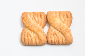 Cookies biscuits sugar isolated on white background in top view close up