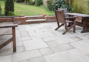 New stone garden patio in backyard, UK