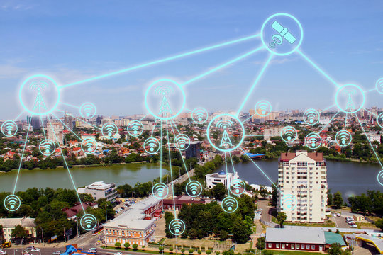 IOT, Internet smart city and network connect Wi-Fi access points. Background and Wi-Fi icons on the background of the city.