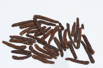 Long pepper or Piper longum on white background
Long black pepper (Also called as Pipli in Indian, capsicum frutescens, Balinese pepper, Jaborandi pepper, Bengal pepper, Dipli in Thai, Piper longum)