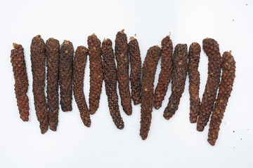 Long pepper or Piper longum on white background
Long black pepper (Also called as Pipli in Indian, capsicum frutescens, Balinese pepper, Jaborandi pepper, Bengal pepper, Dipli in Thai, Piper longum)
