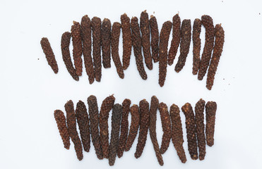 Long pepper or Piper longum on white background
Long black pepper (Also called as Pipli in Indian, capsicum frutescens, Balinese pepper, Jaborandi pepper, Bengal pepper, Dipli in Thai, Piper longum)