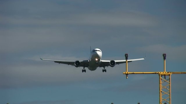Passenger plane flying low overhead