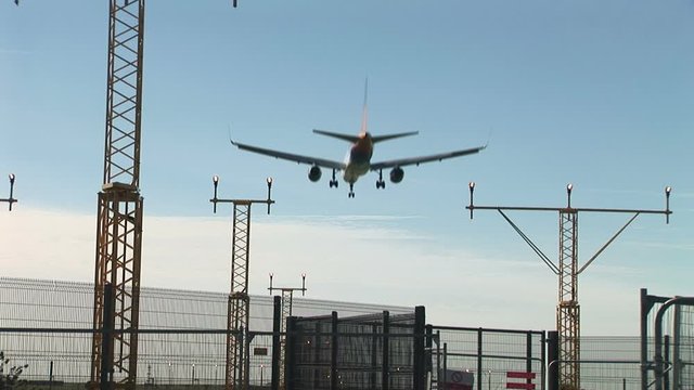 Passenger plane flying low overhead