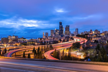 Long exposure traffic on the freeway with the Seattle skyline in the background