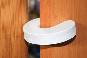 Stopper for the door. Protection against sudden slamming of the door. Children's finger protection. Child safety. Safe home. Protection for babies.