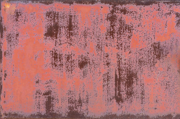 peeling red paint. dirty profiled metal sheet. rusty metal