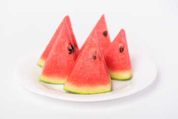 Sliced of watermelon fruit on white dish ready to eating, tropical fruit