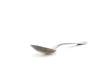 Tarnished Silver Spoon