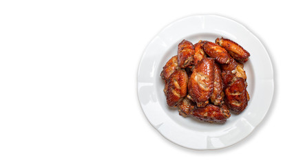 Fried chicken in plate isolated on white background. The fried chicken that is fried is cooked in a beautiful yellow color. With clipping path