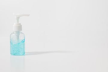 White pump bottle of hand sanitizer gel in  isolated on a white background. Sanitizer gel for corona virus or Covid 19 protection.