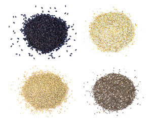 Pile of white and black sesame seeds, Quinoa, chia seed isolated on white background. Healthy eating and superfood concept. Top view. Flat lay.