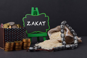 Islamic zakat concept. A contribution structure for Muslims or moslems to help the poor and needy. Conceptual shoot for property, income and fitrah zakat.