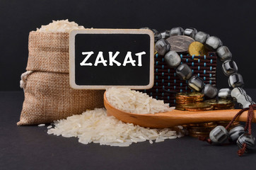 Islamic zakat concept. A contribution structure for Muslims or moslems to help the poor and needy. Conceptual shoot for property, income and fitrah zakat.