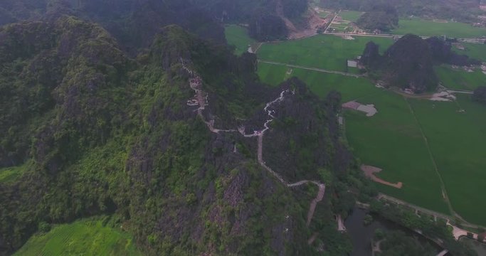 Aerial view of Tam Coc Bich Dong, part of the Trang An Scenic Landscape Complex UNESCO World Heritage site, Ninh Binh. Tam Coc is a flooded cave karst system, Bich Dong is a series of moutain pagodas