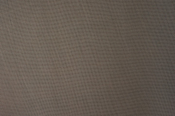 dark abstract background: unique wavy pattern of overlaying two grids, blurry and brown