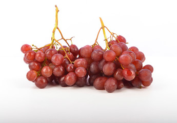 fresh red grapes isolated on white background.
