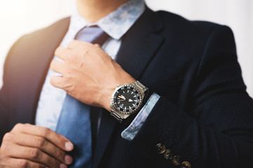 watch on wrist of man