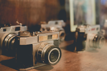Vintage and old film camera, collectibles. retro technology. vintage color tone.