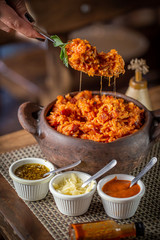 Spiced rice with sausage and cheese