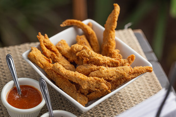 breaded chicken breast strips with dressings