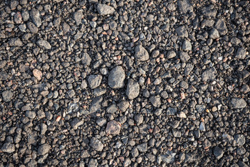 Background image of the surface of a gravel walking path