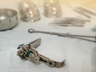 close up of metal speculum and blur background.