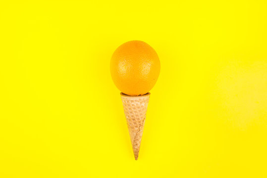 Orange flavour ice cream concept image.