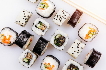 Set of sushi rolls on a white background.