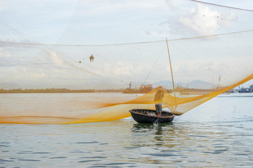 Fisherman worked in fishing village of Cua Dai, Hoi An, Vietnam. Hoian is recognized as a World Heritage Site by UNESCO.