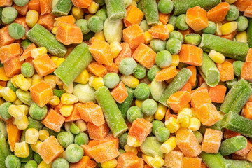 closeup background and texture of frozen vegetable medley