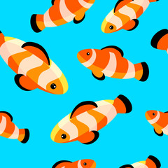 seamless pattern with bright clown fishes on blue background.
