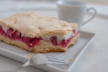 Home made rhubarb meringue cake on a plate