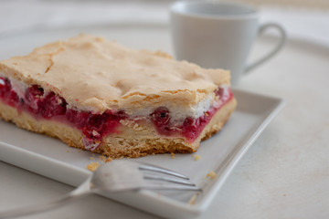 Home made rhubarb meringue cake on a plate