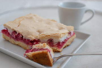 Home made rhubarb meringue cake on a plate