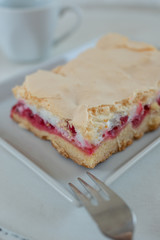 Home made rhubarb meringue cake on a plate