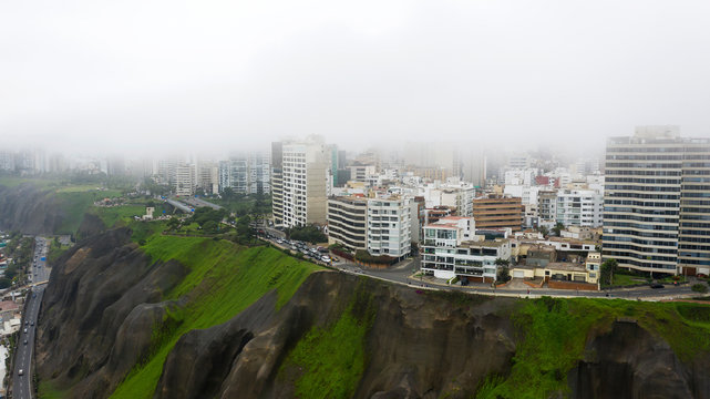 Aerial view of Lima coastal line and Love Park "Parque del Amor' next in Miraflores.