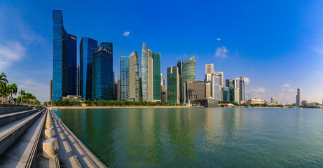 Panorama of downtown Singapore city business district skyline at Marina Bay with Esplanade in the background - obrazy, fototapety, plakaty